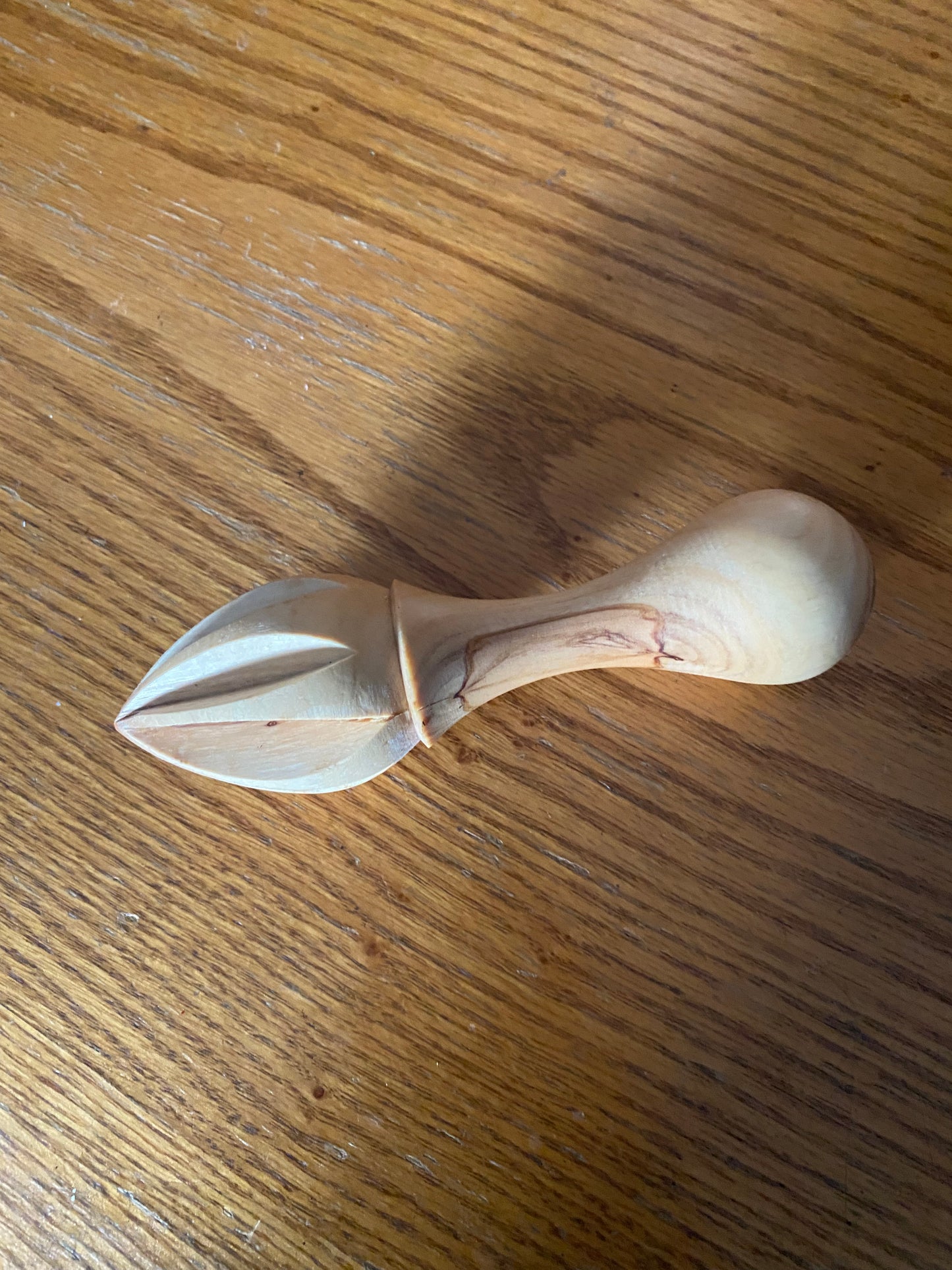 Wooden lemon squeezer